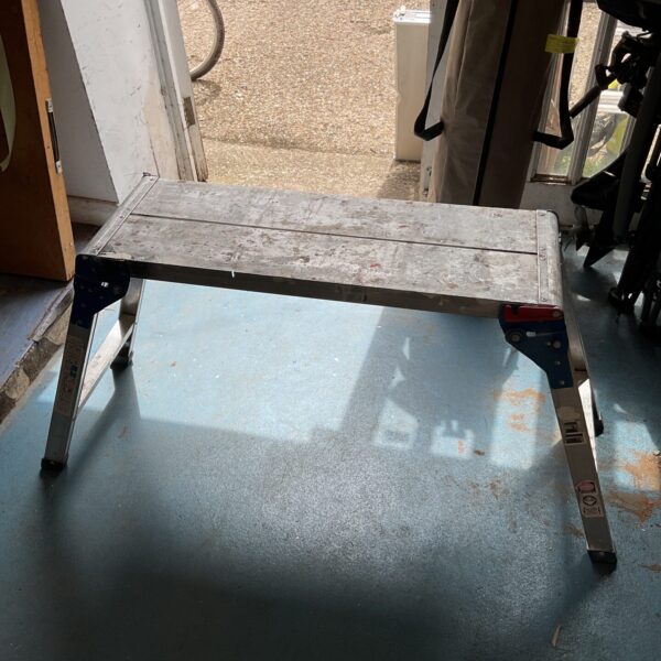Metal folding decorators platform for DIY projects and access.