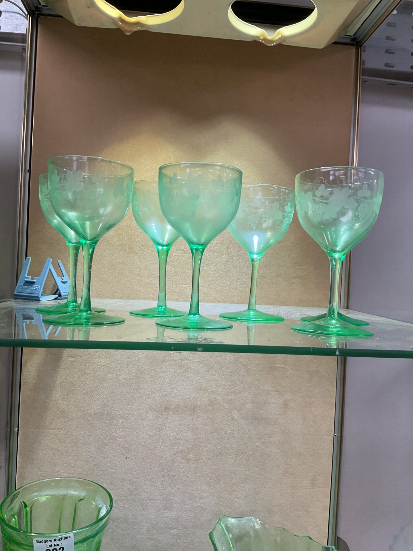 801 Seven hand engraved green uranium wine glasses