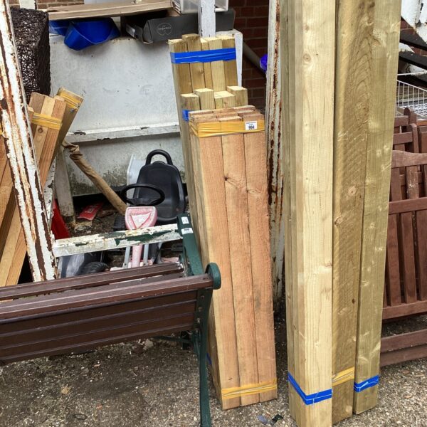 Three bundles of 4ft softwood timber for construction and DIY projects.