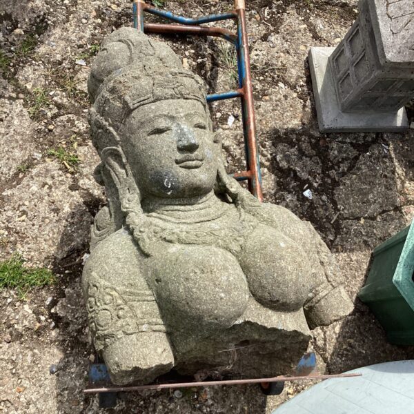Detailed stone Shiva bust, a Hindu religious sculpture.