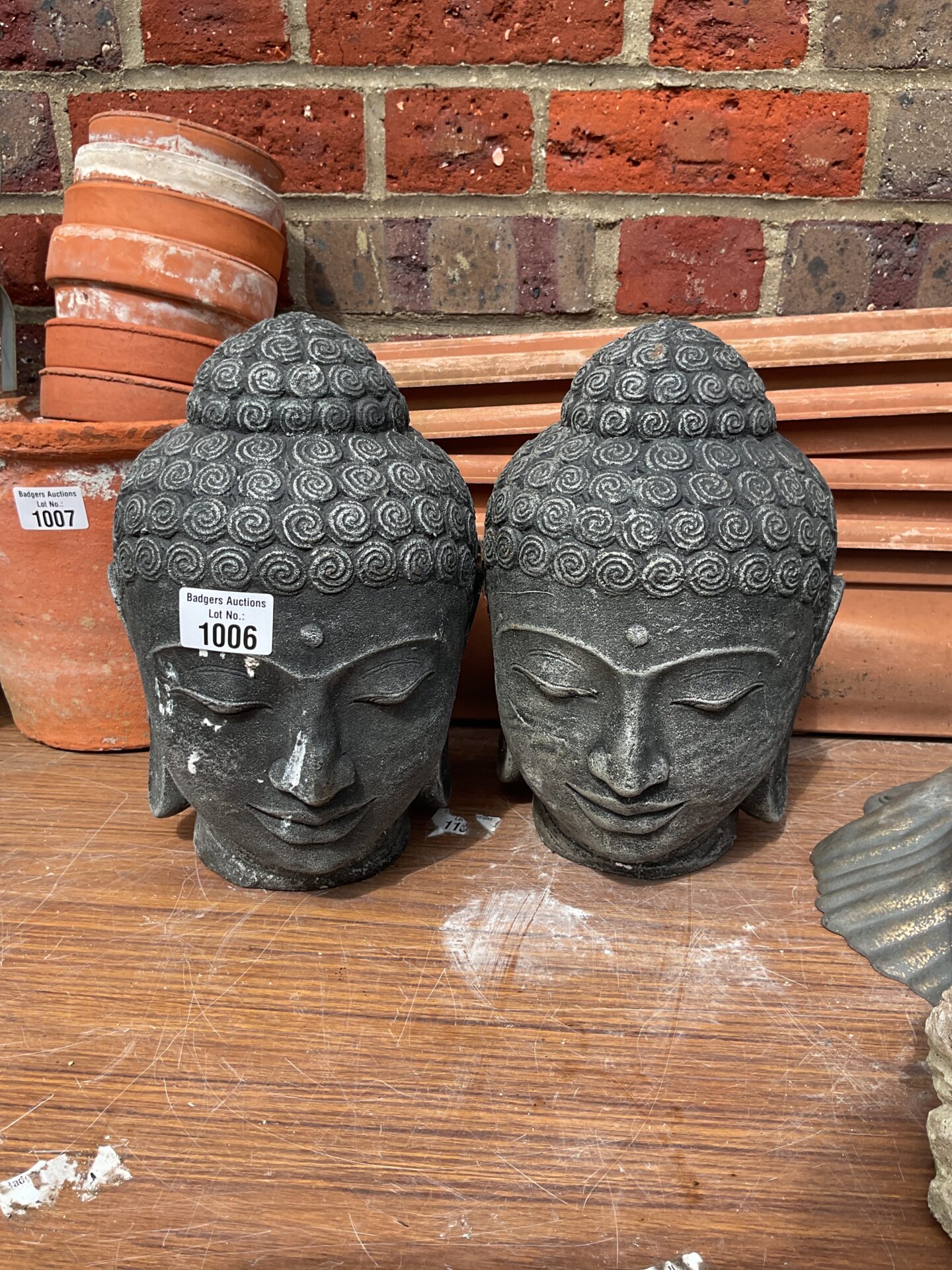 1006 Two buddah stone heads