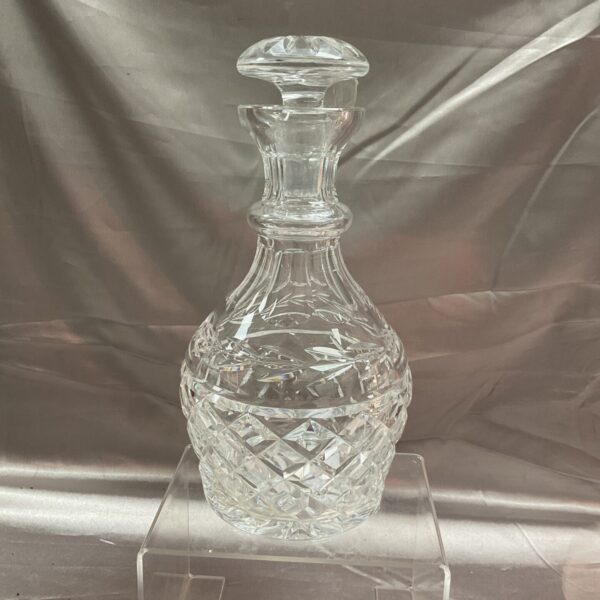 Elegant Waterford crystal decanter with intricate cut glass design.
