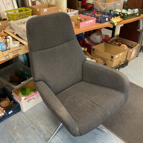 Grey fabric swivel armchair with a modern design.