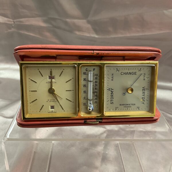 Vintage Goblin travel alarm barometer clock, needing attention.