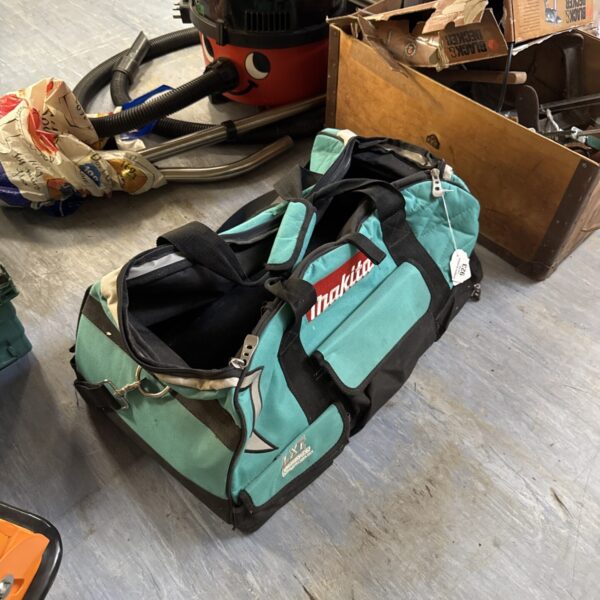 Front view of a Makita tool holdall, showing pockets and branding.