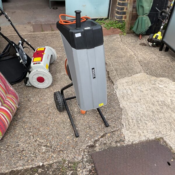 Electric Titan garden shredder for reducing garden waste.