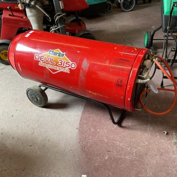 Red Clarke Devil 3150 gas heater for workshops or garages.