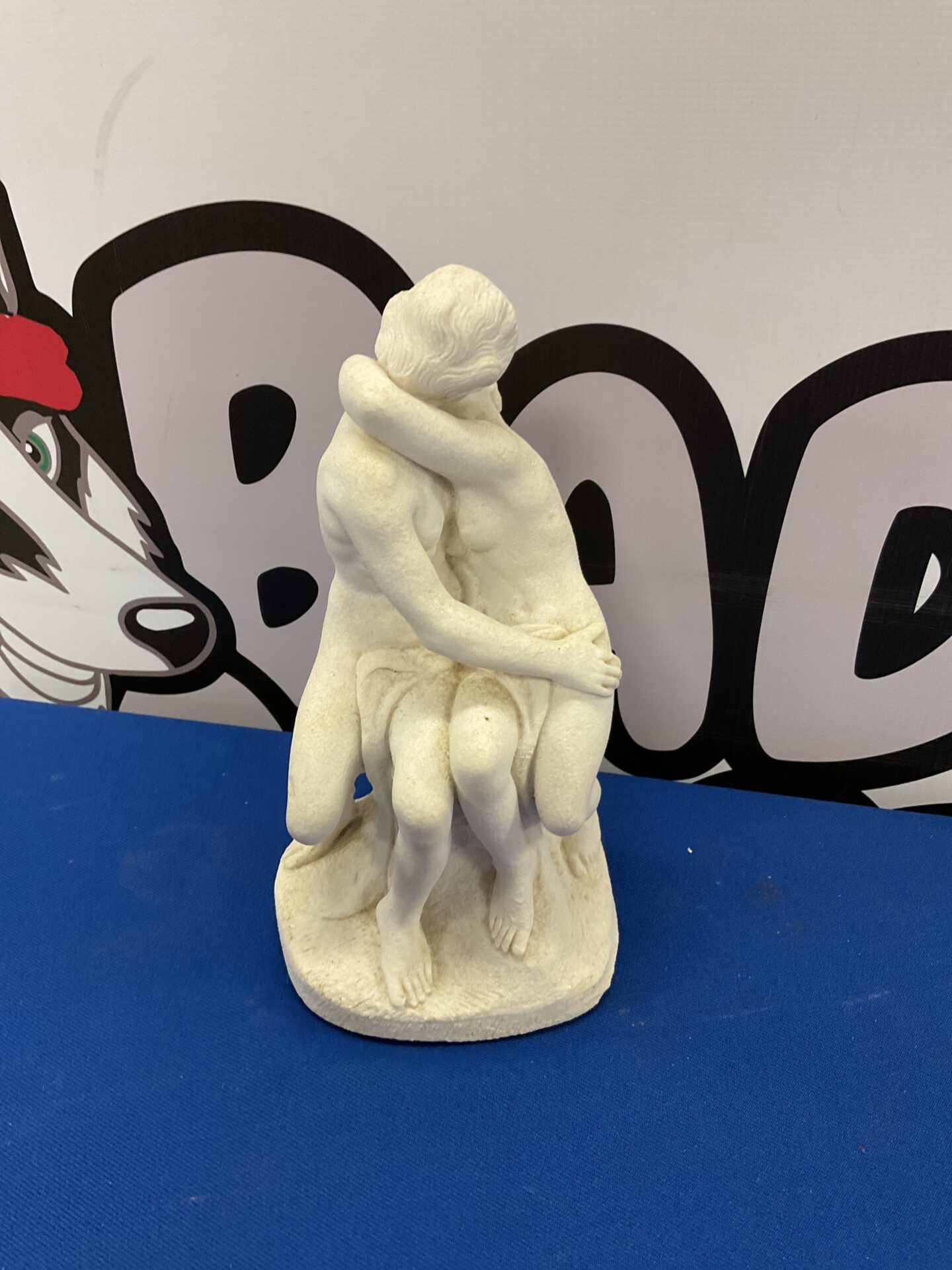 303 Porcelain sculpture of lovers embracing