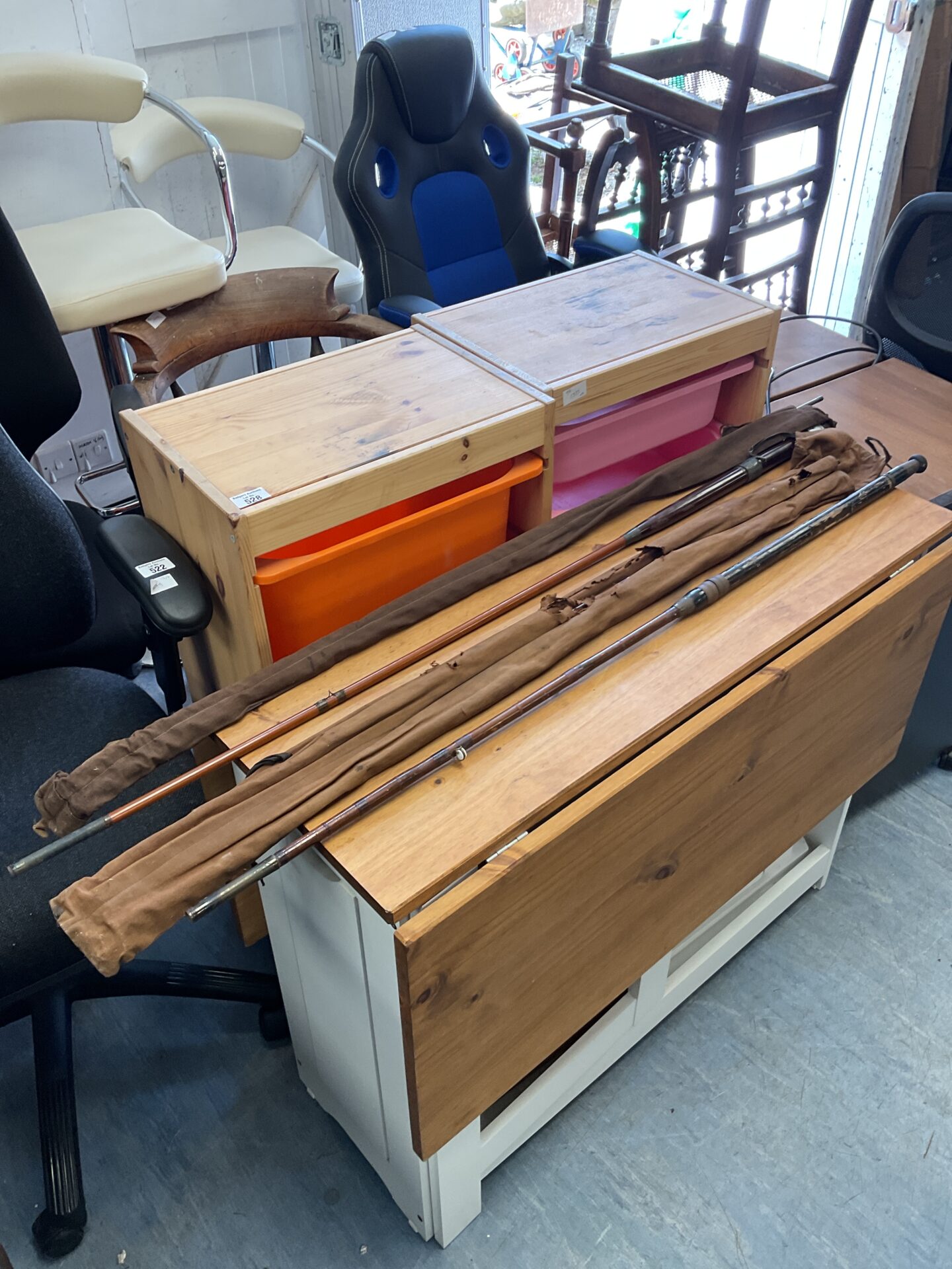 487 Two antique cane fishing rods