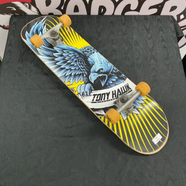 Vintage Tony Hawk skateboard with eagle graphic deck.