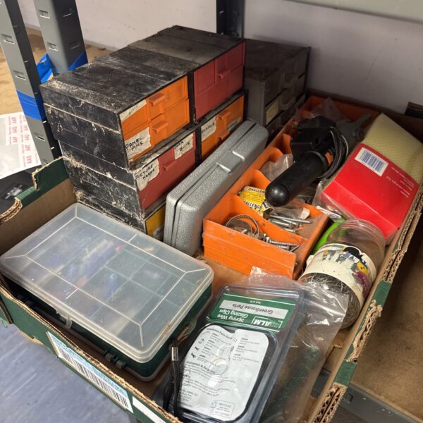 Assorted tools and organisers in a shed clearance lot.