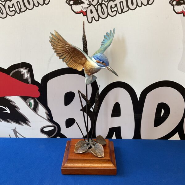 Detailed Danbury Mint kingfisher sculpture on wooden base.