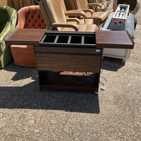 Vintage Ekco hostess trolley with wood finish and hot plates.