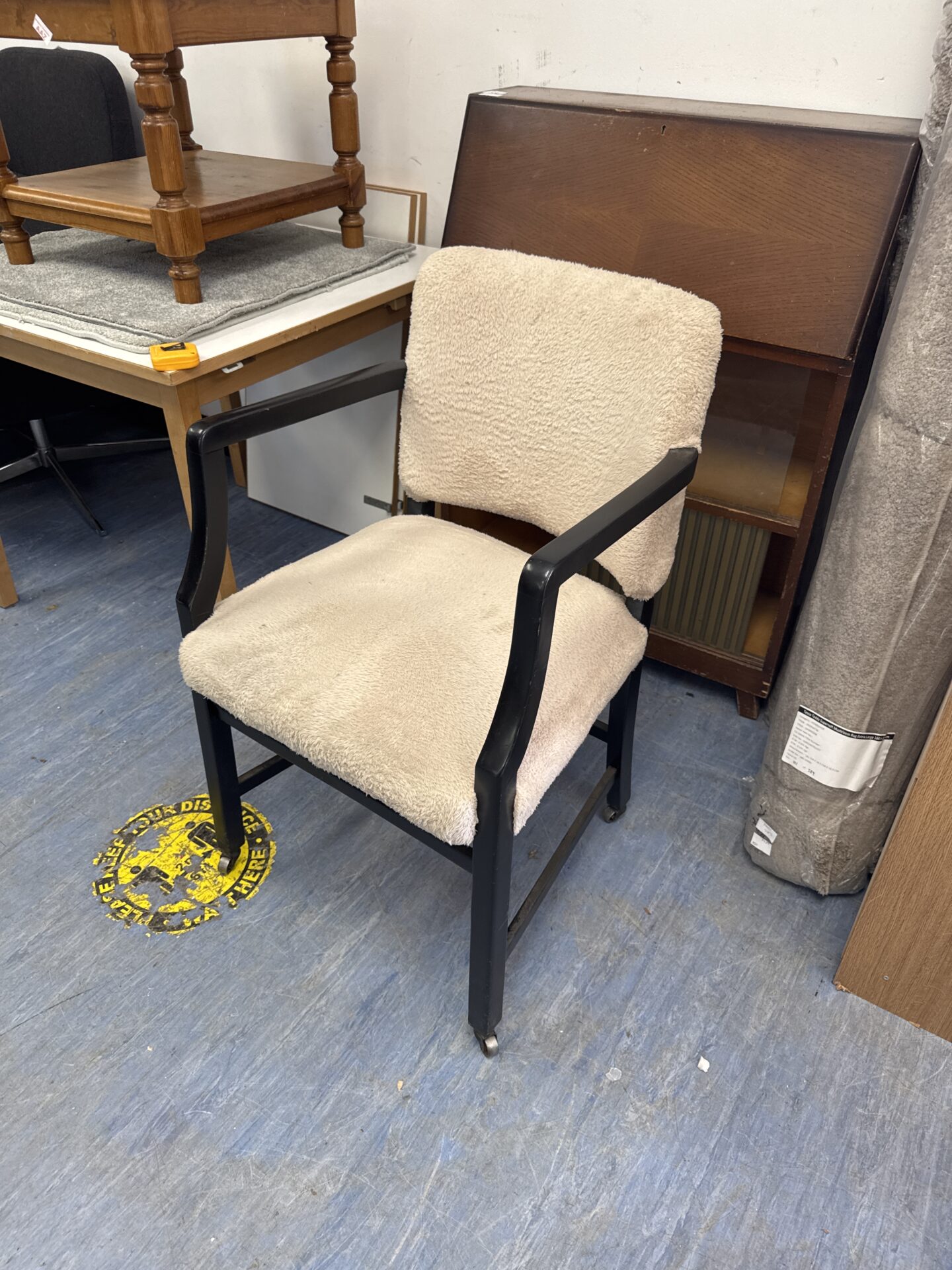 535 Vintage faux fur armchair on castor wheels