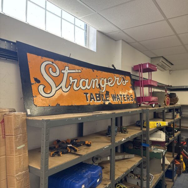 Large vintage Stranger’s Table Water enamel advertising sign.