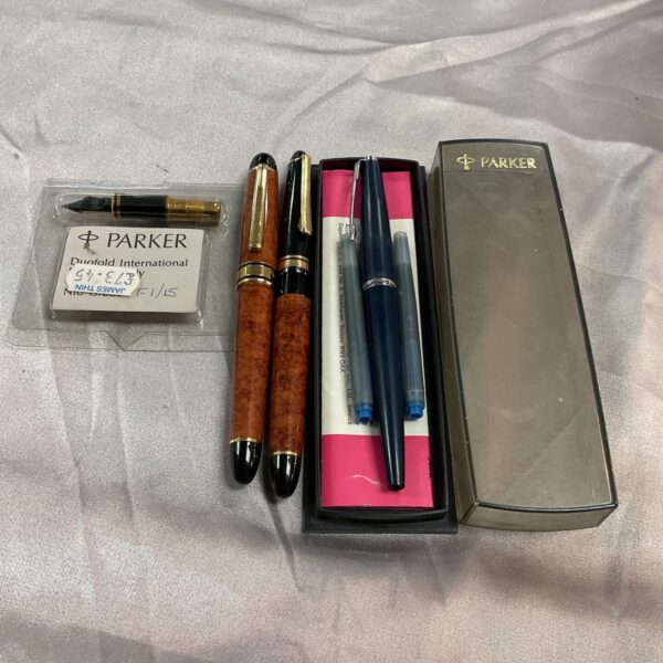 Parker fountain pen set, vintage and new, collectible writing instruments.