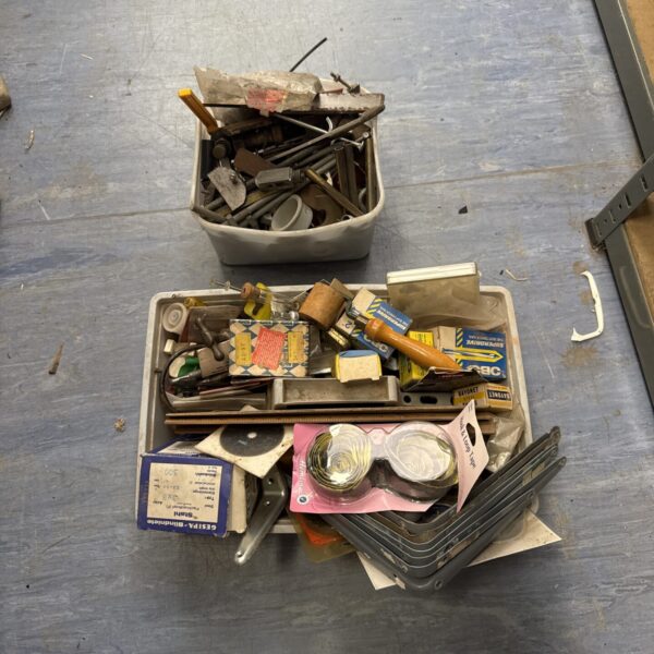 Mixed shed clearance lot with various hardware and tool parts.