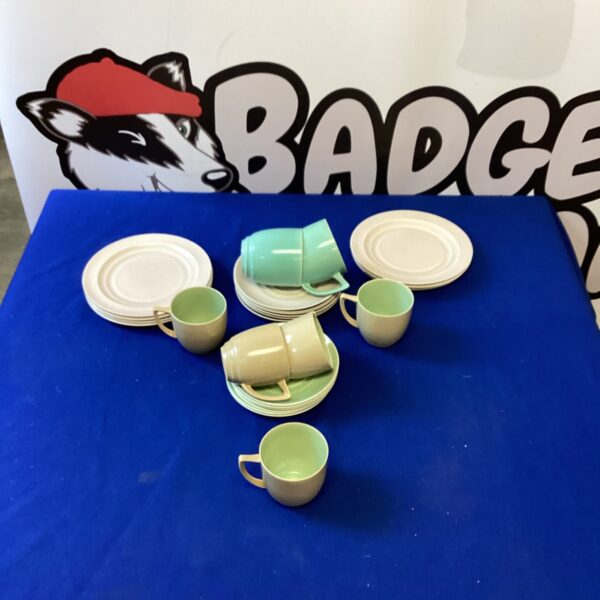 Vintage Branksome Pottery tea cups and saucers in pastel green.