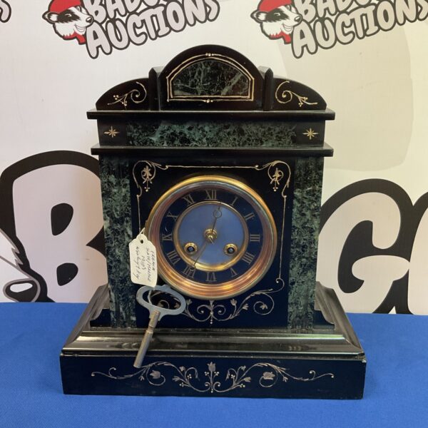 Vintage French slate mantle clock circa 1915 with marble details.