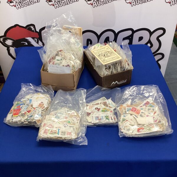 Vintage stamp collection featuring England World Cup and Lundy puffin stamps.