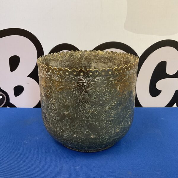 Intricate antique Indian brass jardiniere with floral designs.