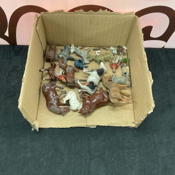 Vintage Britains lead farm animals and figures in a box.