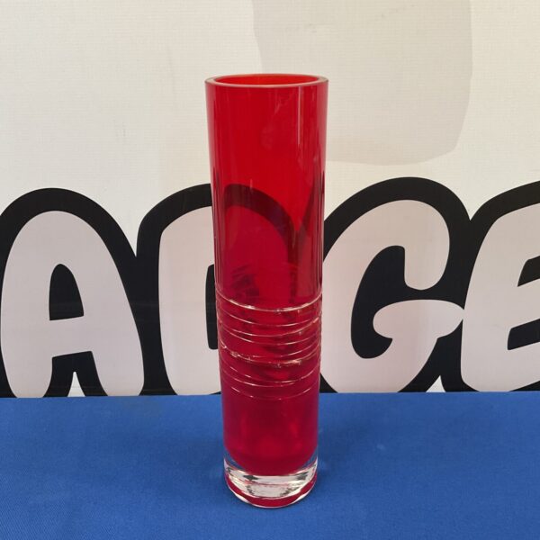 Vibrant red hand-blown glass vase for home decor.
