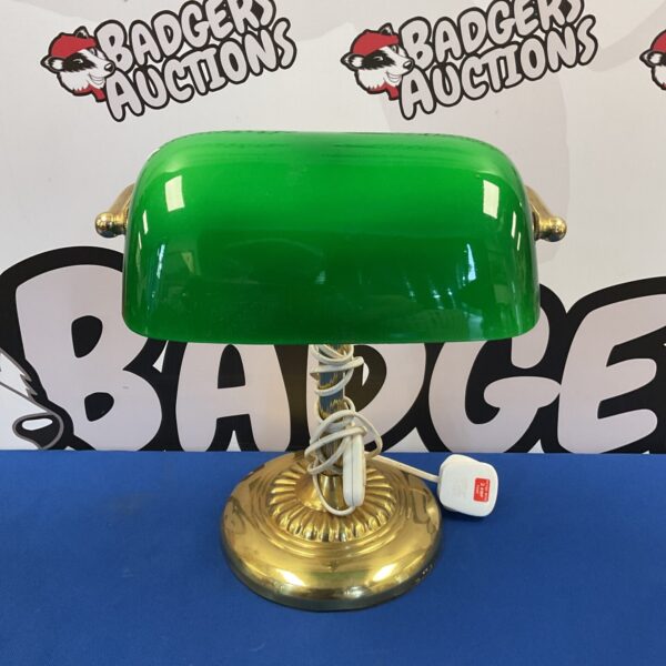 Vintage brass and green glass bankers lamp for desk lighting.