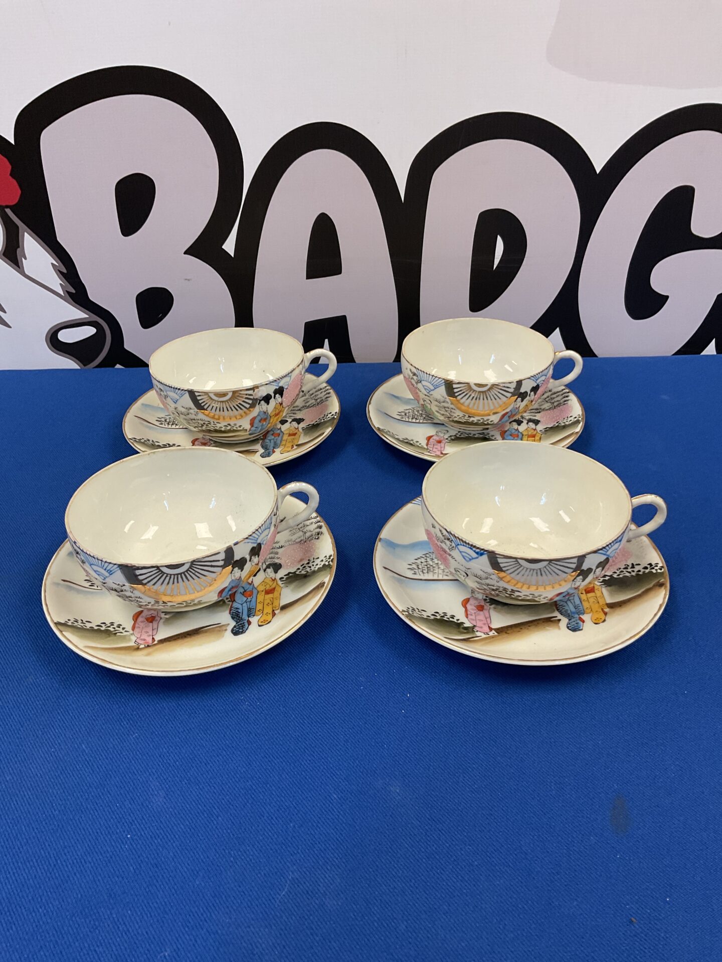 050 Set of four Japanese porcelain teacups & saucers