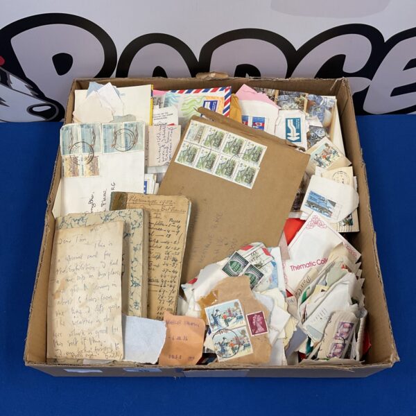 Vintage stamp and letter collection with various postal items.