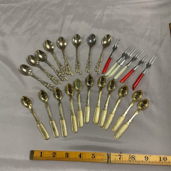 Vintage teaspoon collection featuring Silkema gift spoons.