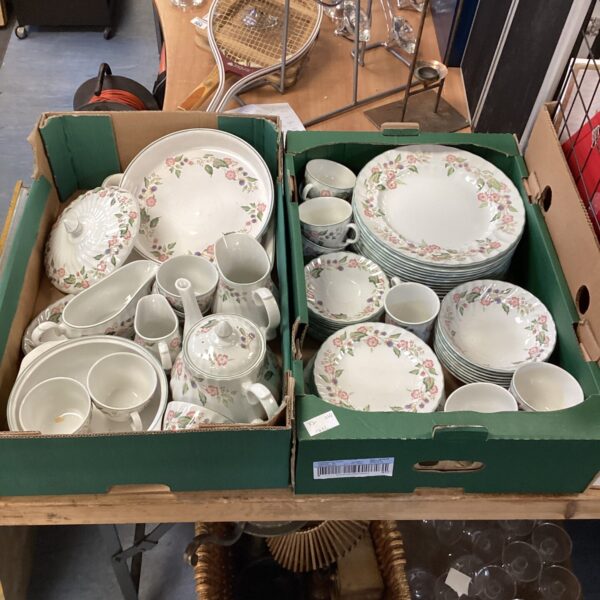 Large Victorian Rose dinner service set with floral design.
