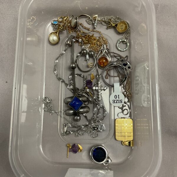 Tray of mixed costume jewellery including silver pieces.