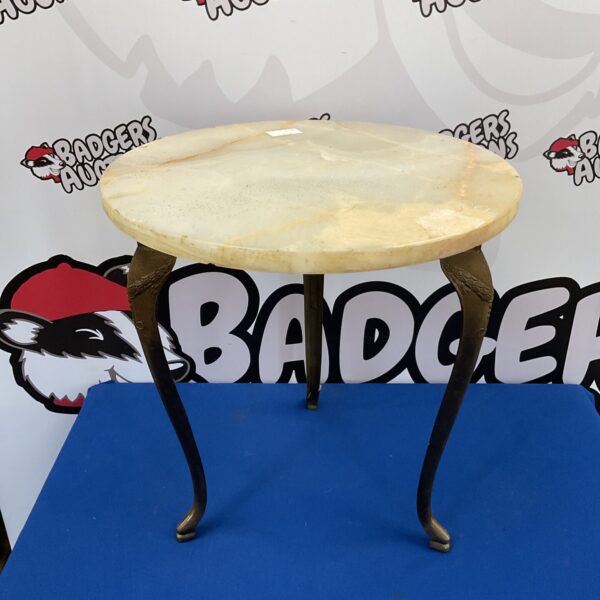 Vintage mid-century marble table with brass tripod base.