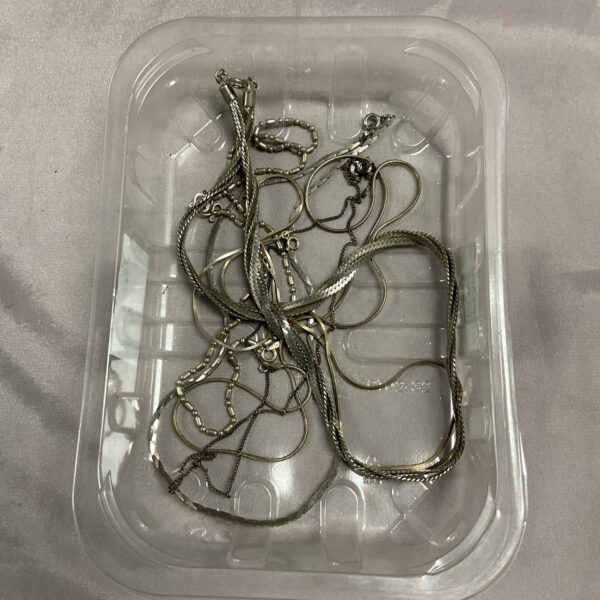 Tray of assorted vintage and costume necklaces for collectors.