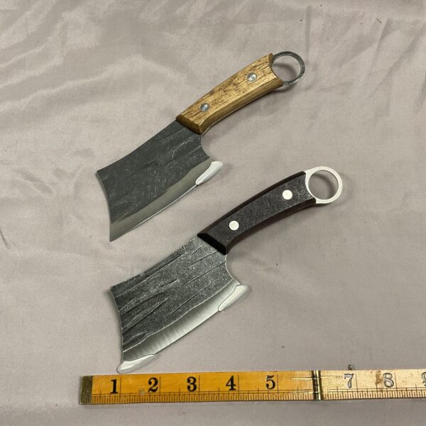 Vintage spice chopping knives with wooden handles.