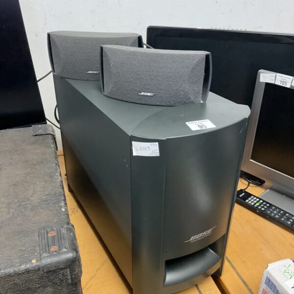 Used Bose Acoustimas subwoofer with satellite speakers for home theater.