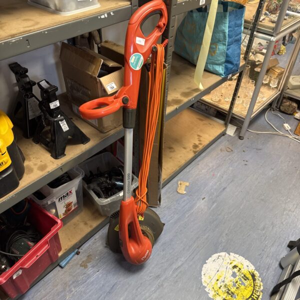 Used Flymo Contour 500 garden strimmer for sale, garden tool.