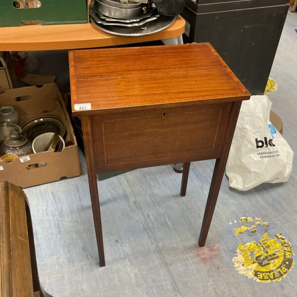 Antique Edwardian mahogany sewing box with inlaid detail.