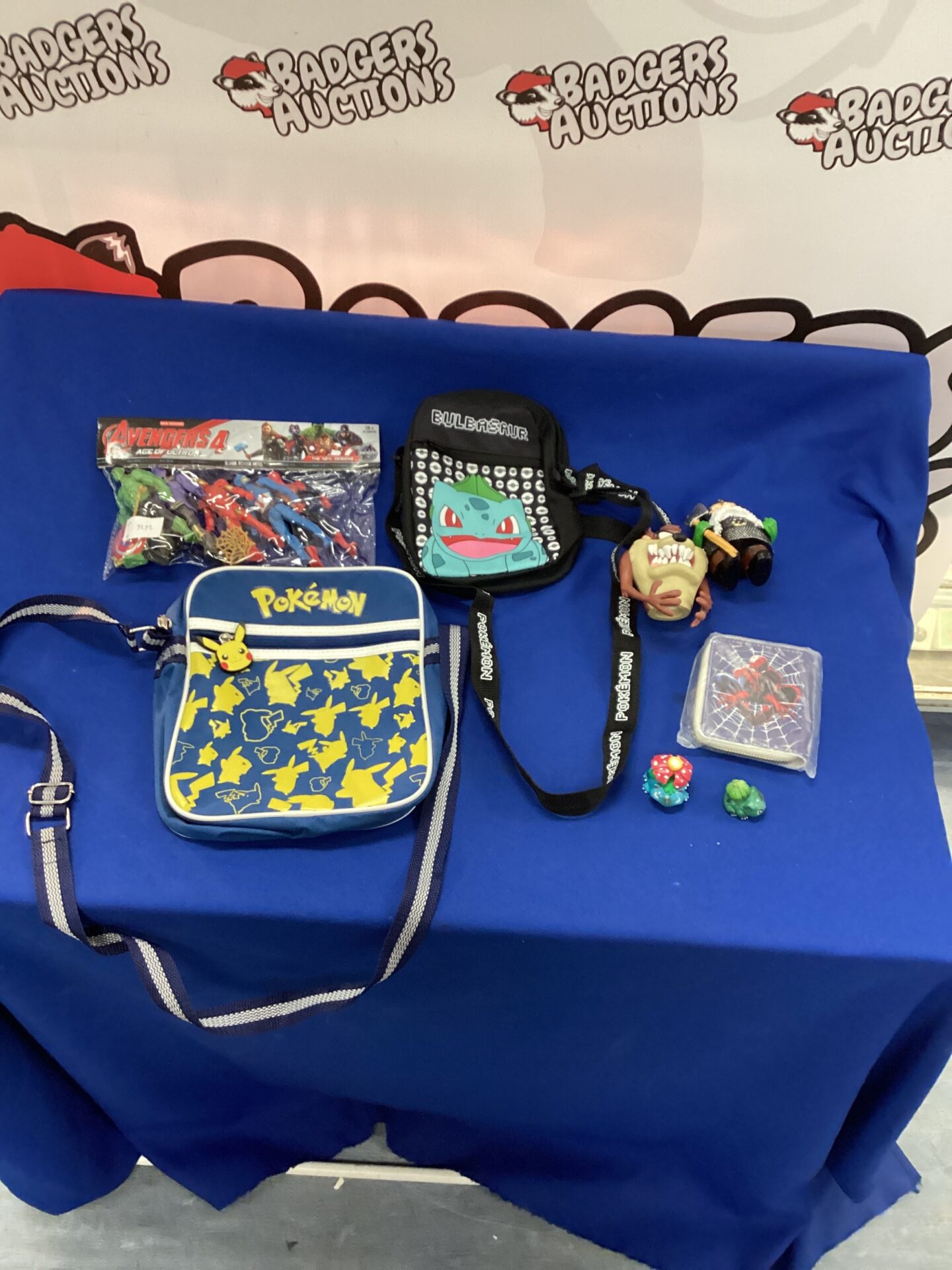 335 Collection of mixed items inc pokemon, marvel and Tasmanian Devil