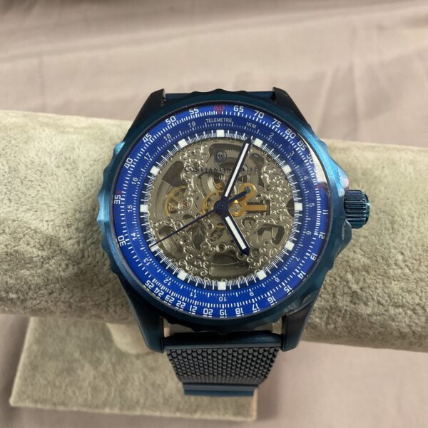 Stylish Constantin Weiss automatic watch with a skeleton dial and stainless steel bracelet.