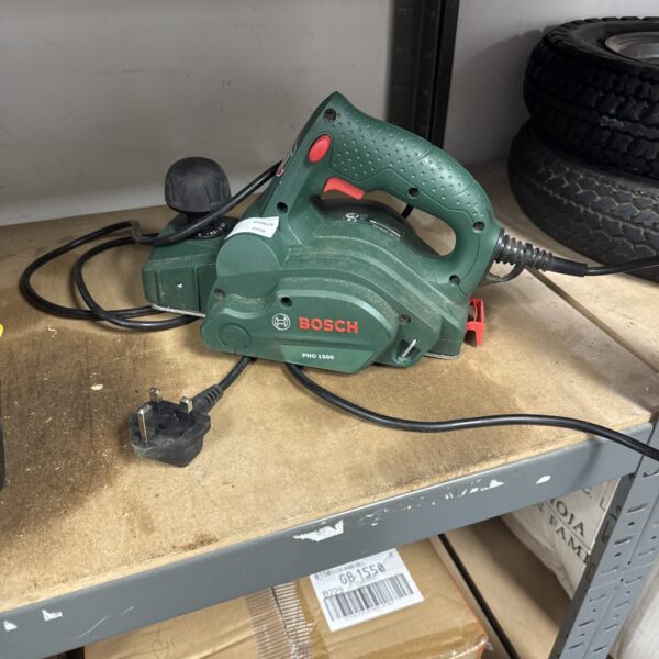 Bosch PHO 1500 electric planer for woodworking projects.