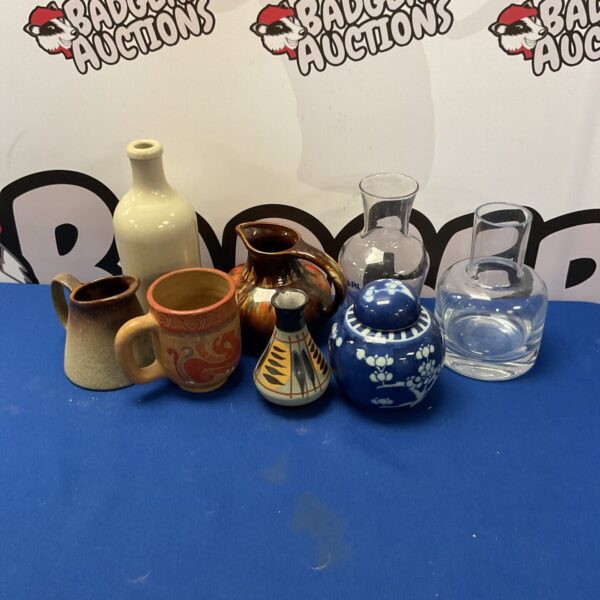 Mixed lot of studio pottery and glassware with a ginger jar.