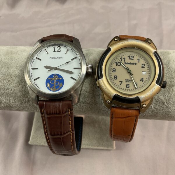 Pair of vintage Royal Navy and Timberland quartz wristwatches.
