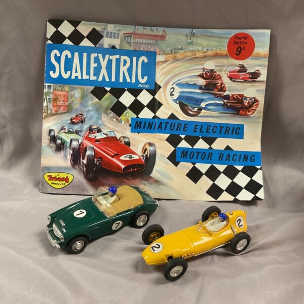 Vintage Scalextric Lotus and Austin Healey racing cars, collectible toys.