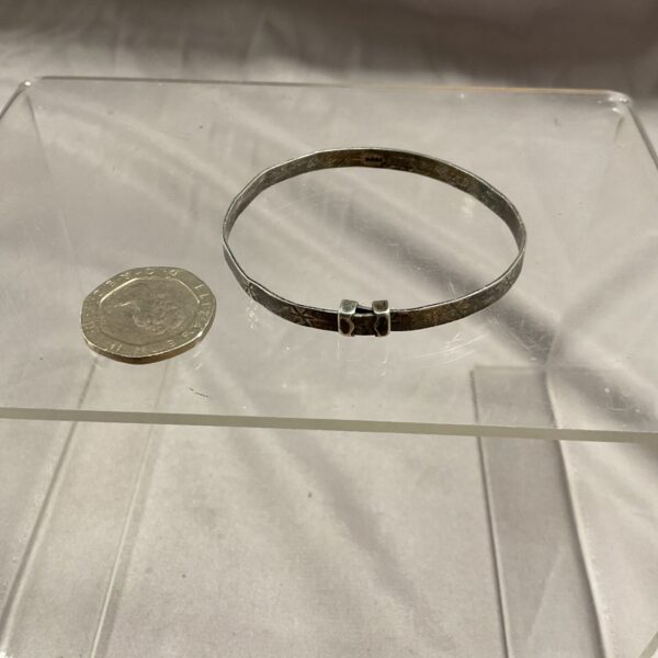 Vintage sterling silver christening bracelet, a classic baby gift.