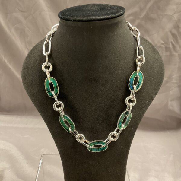 Silver tone necklace with abalone shell T bar pendant.