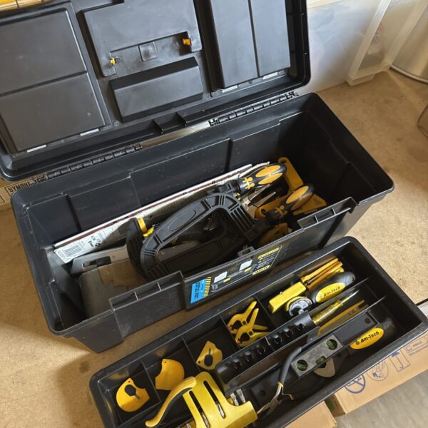 Workzone 20 inch plastic toolbox filled with various hand tools.