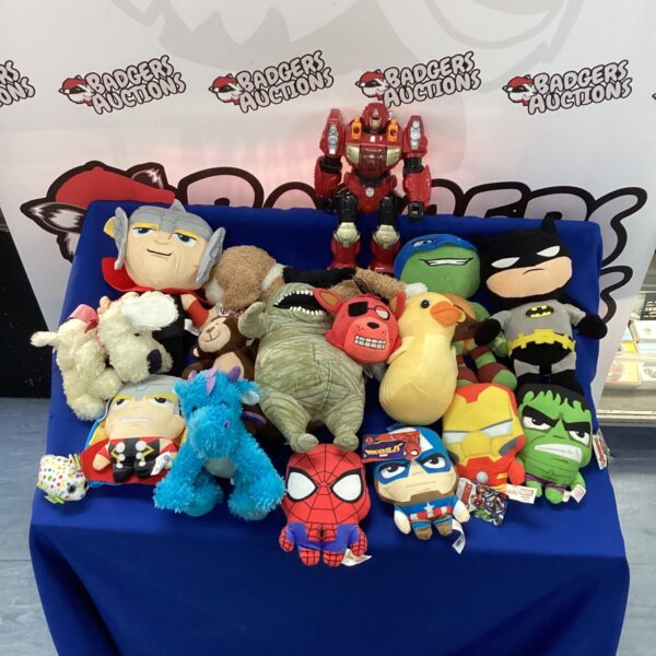 Colourful soft toy bundle featuring a Batman plush toy.