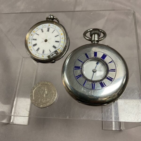 Antique silver pocket watches, including a Russel Ltd half hunter.